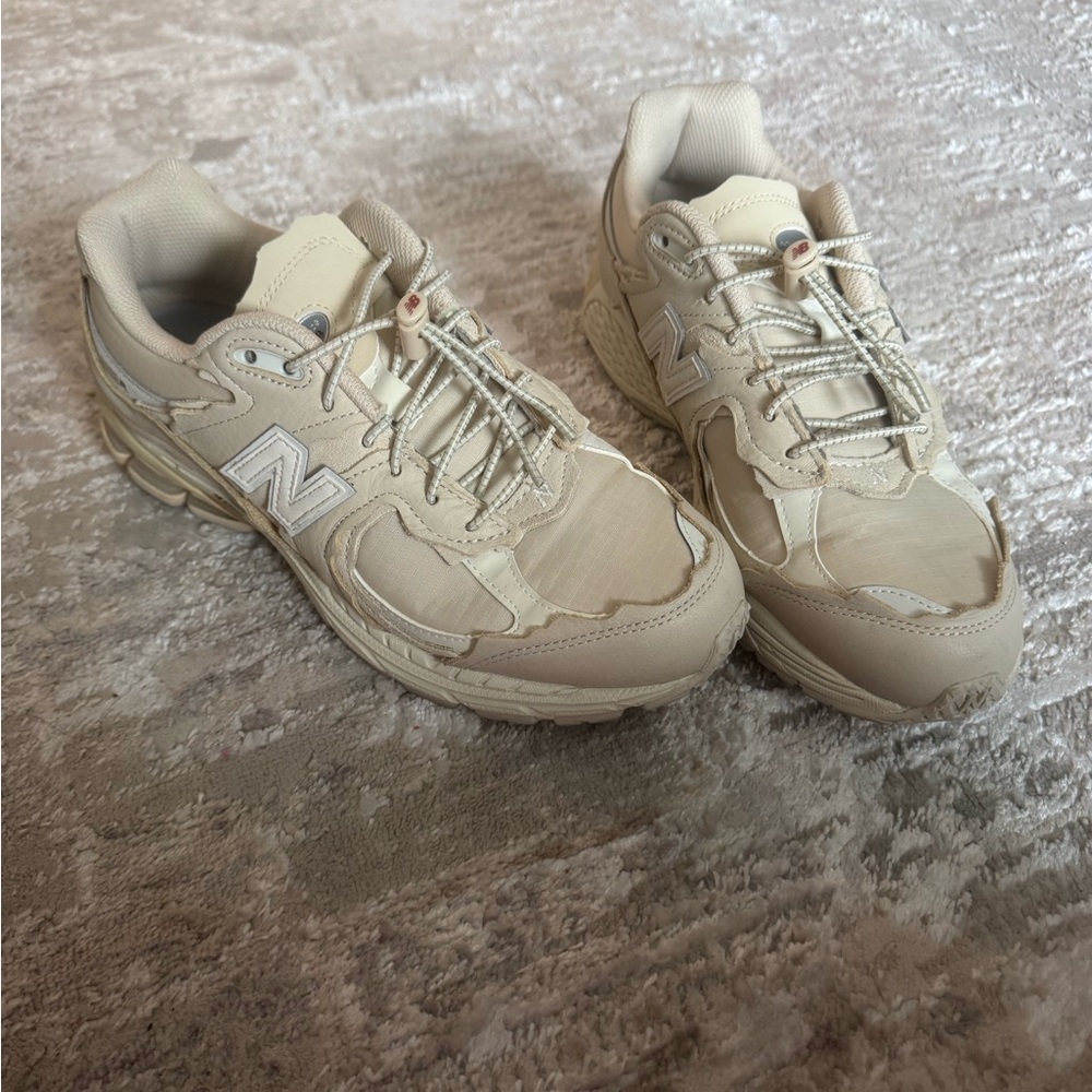 New Balance Cream Athletic Shoes